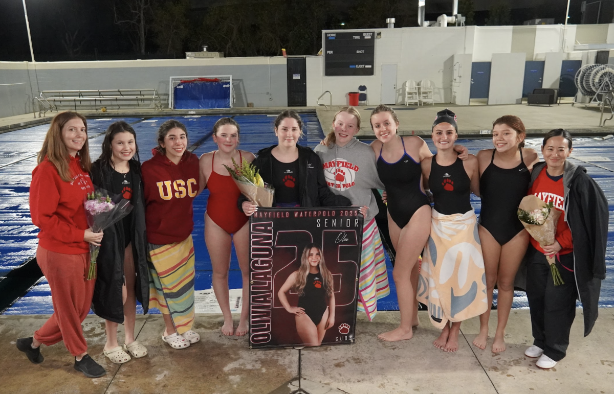 The waterpolo team and coaches celebrate senior Olivia Laguna!